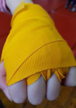 yellow boxing hand wraps.