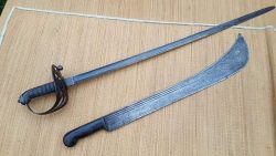 Long -Wide Victorian era Machete with horn slab grips. £145.00( Victorian Officers sword above not included. For size comparison only)