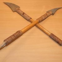 Long hand made Martial arts weapons. The blades of thick Aluminium.  Wooden hafts/ shafts. Bound with leather thongs at each end with wrist straps.  £45.00  the pair .