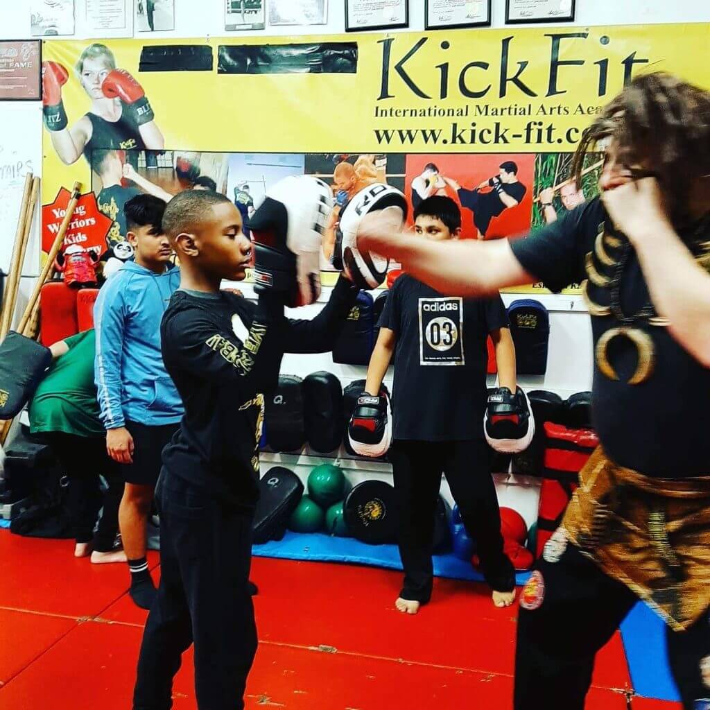 Grand Master Sifu Hudson teaching the Young Warriors class in Halloween fancy dress