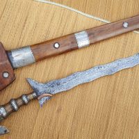 (AMOROKRISSW0001) Large Antique Vintage Morro Philippine Sundang Kris Fighting sword with a large double edge wavy Blade.